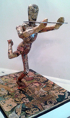 Stressed action figure comic book sculpture